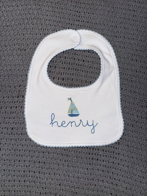 blue picot trim bib with monogram