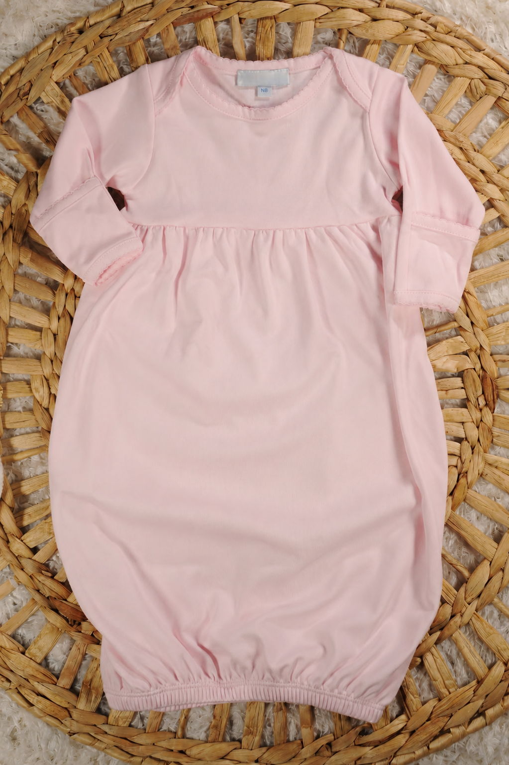 Pink gown with picot trim with monogram